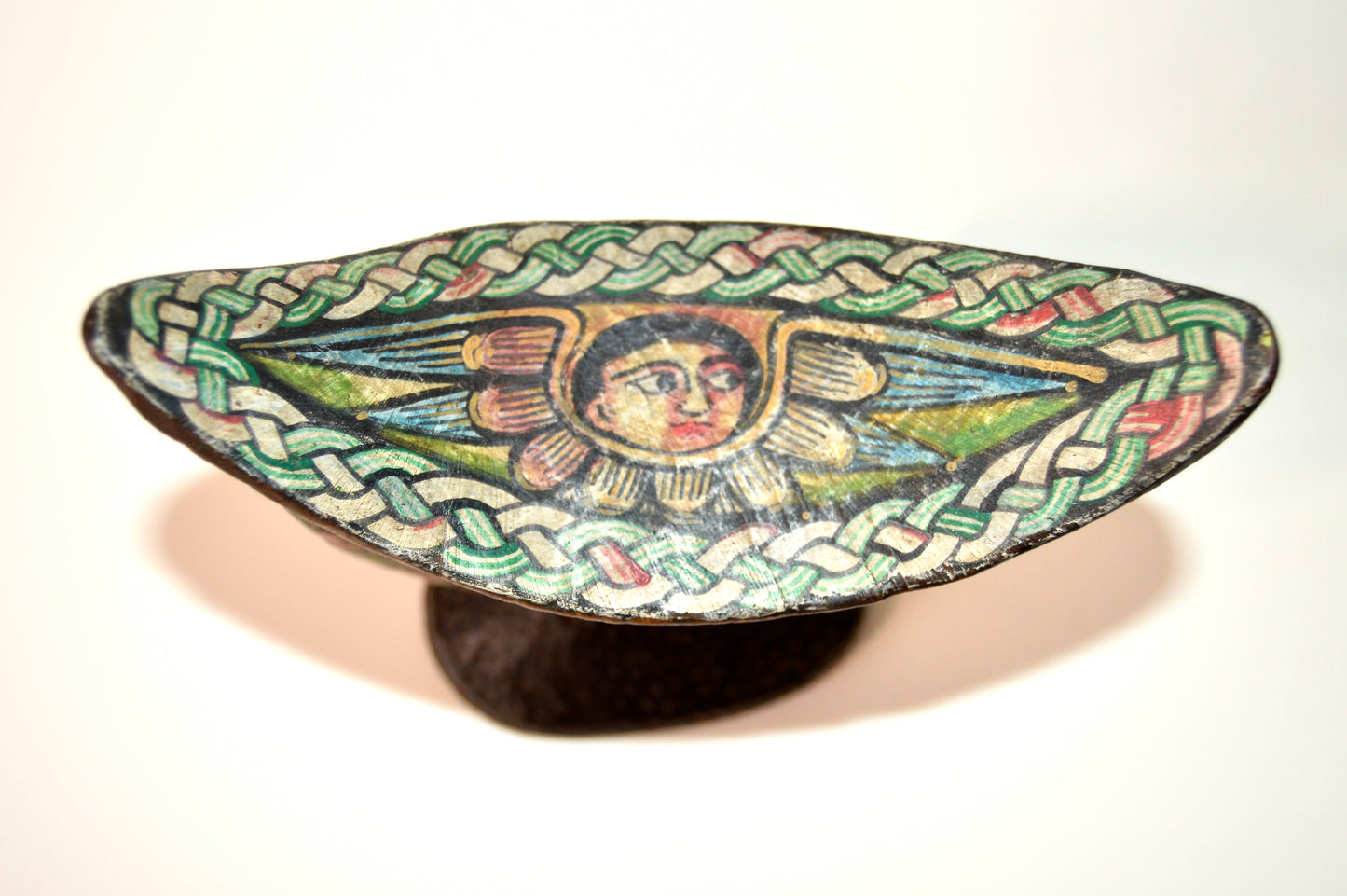 Reposacabeza  decorativo de madera